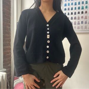 Black sweater with button details